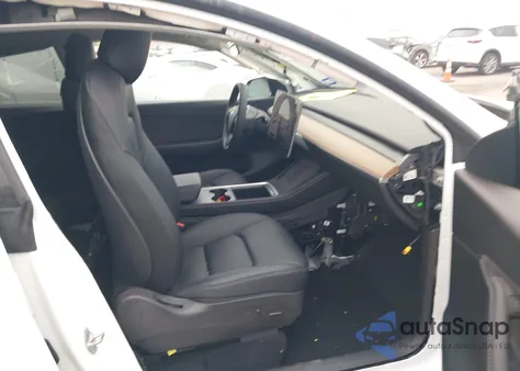 2022 Tesla Model Y from USA, damaged, VIN 7SAYGDEE4NF315356